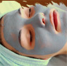 Relaxation with grey cream on the face